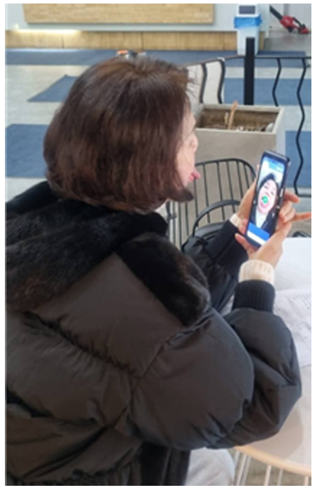 Fig. 2. Oral function training using a smartphone application.